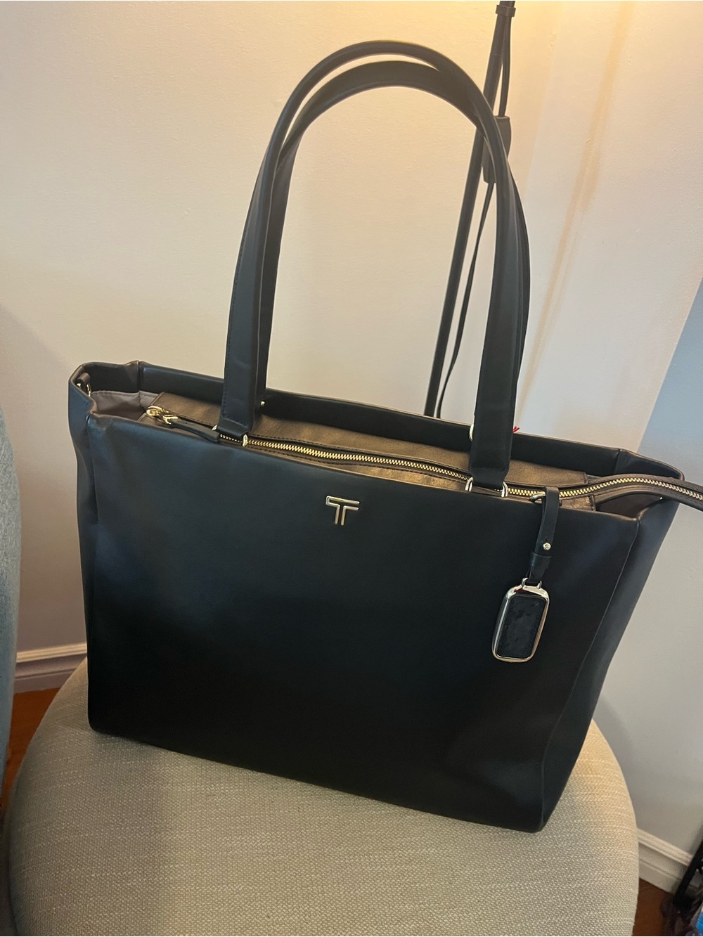 TUMI Black Tote Bag with Gold Hardware